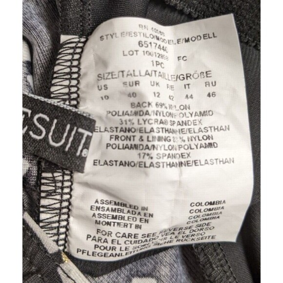 Wmn's MIRACLESUIT One-Piece Keyhole Front Black/White/Gold Metallic Swimsuit 10 - Picture 8 of 9